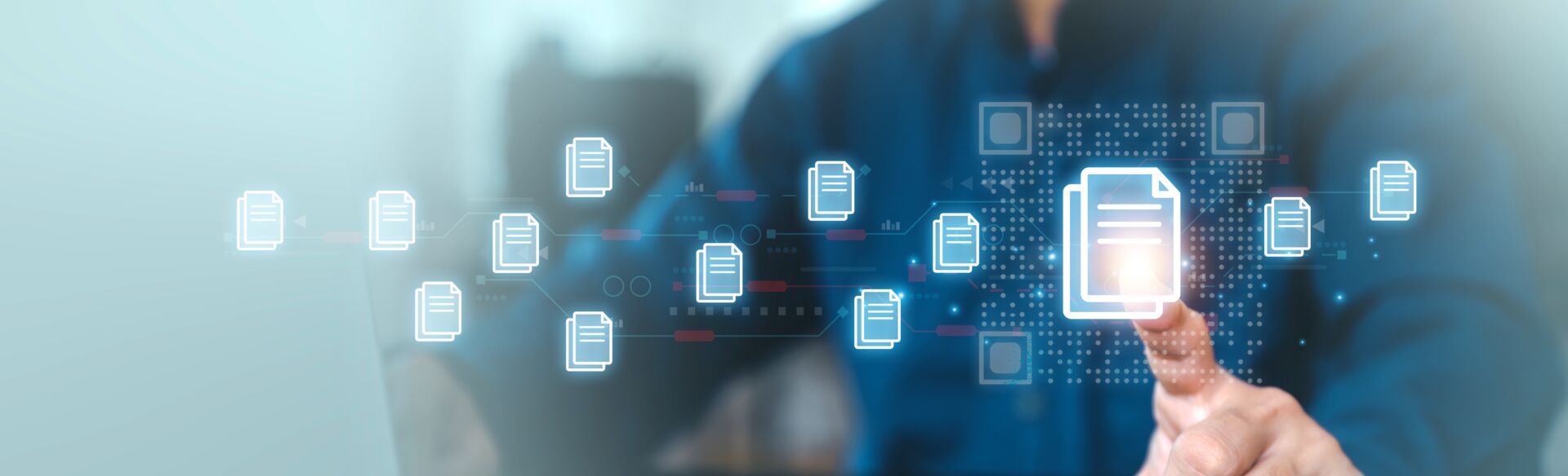 Eine Aufnahme einer Hand, die ein digitales Element berührt